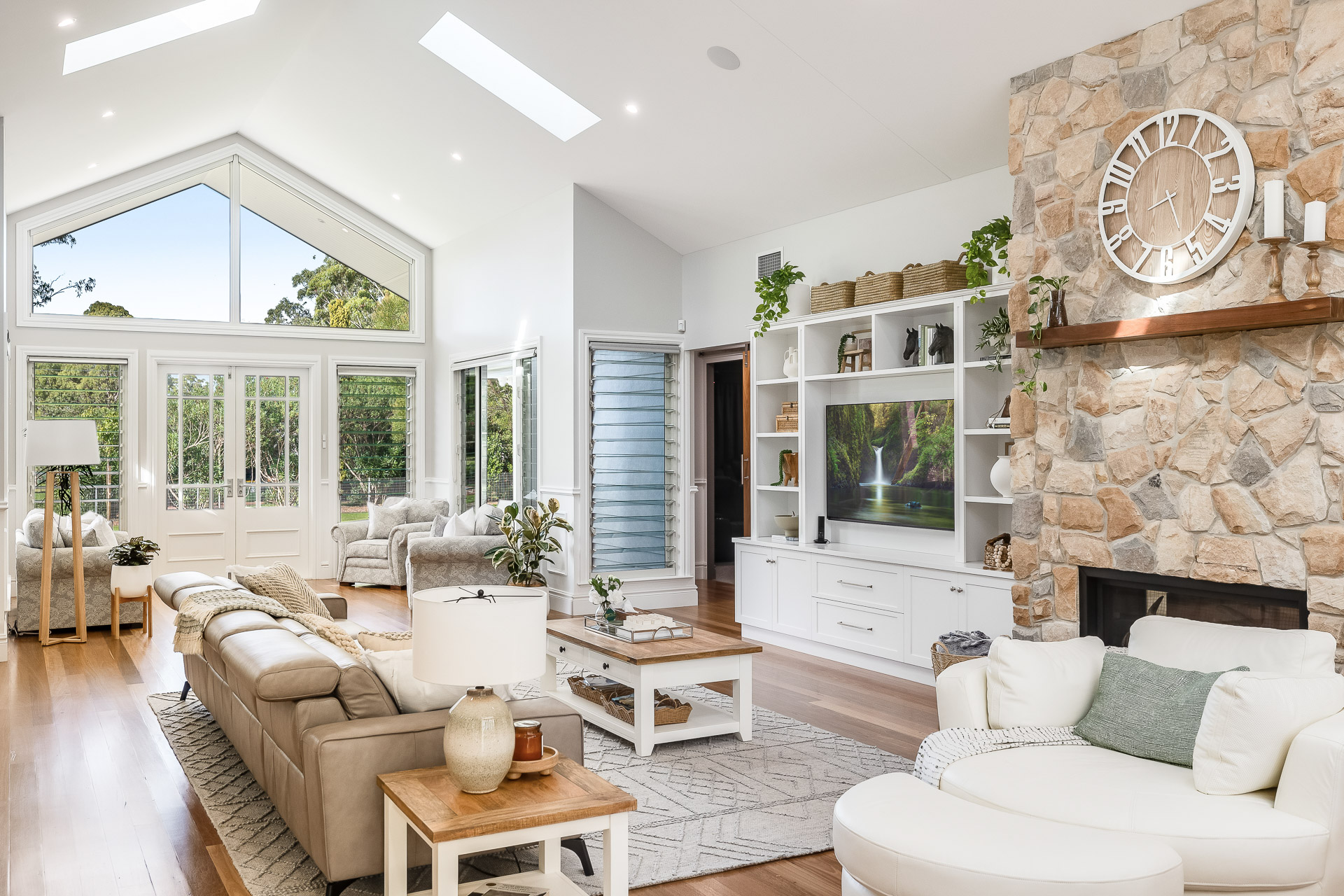 There is a fire pit in the middle of the patio. — Windamere Homes in Highfields, QLD